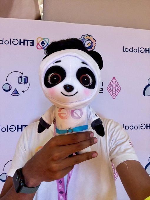 0G panda plush toy held up at ETHGlobal